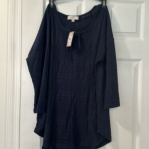 Blue sweater with tie at neck